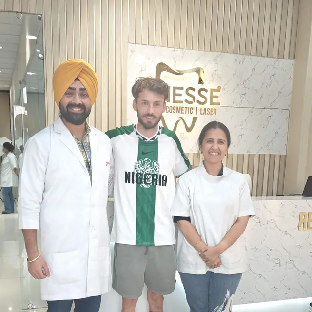 Asmir Sulge with the Finesse Dental team in Mohali