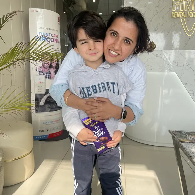 A happy young patient at Finesse Dental, Mohali