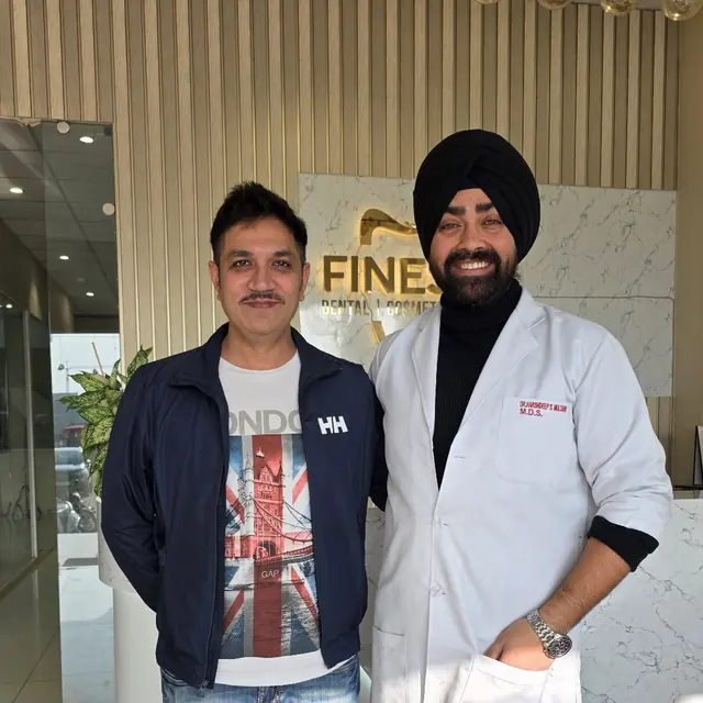 Shariq Zia with the Finesse Dental team after his dental implant treatment in Mohali